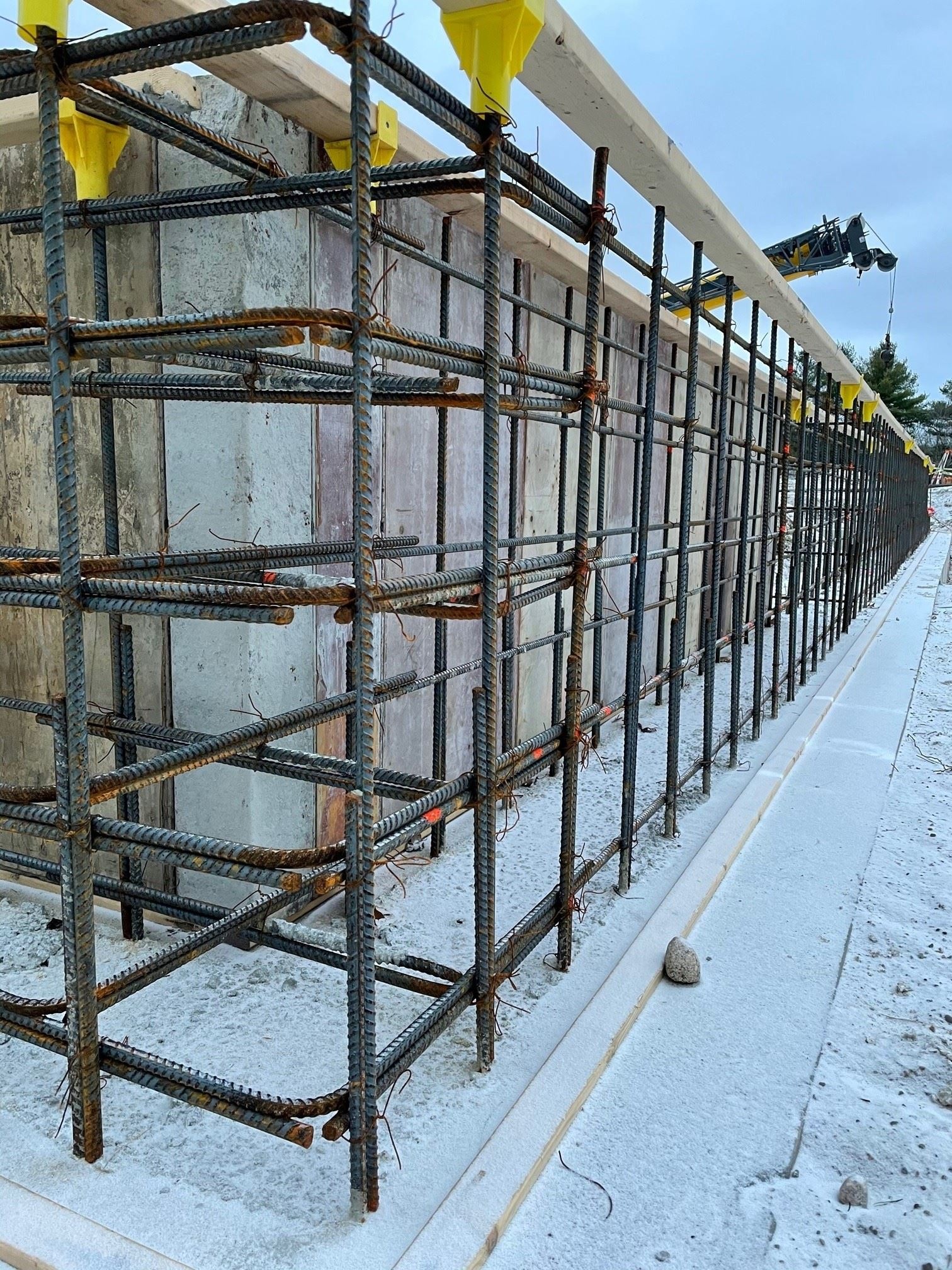 Installation of Frost Wall Rebar, Forms and Placement of Concrete